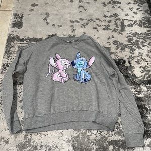 Primark Disney Stitch and Angel gray kissing graphic sweatshirt